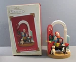 2003 Hallmark "caroling At The Door" Ornament - QXG8819. Fixed Price $8.50.