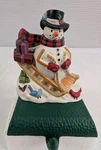 Vintage Eddie Bauer Snowman With Sled Cast Iron Stocking Holder Nos. Fixed Price $39.99.