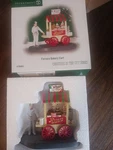 Department 56 Christmas In The City Village Ferrara Bakery Cart 2007 799983. Fixed Price $75.00.