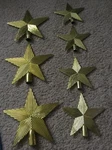 7 Christmas Tree Toppers. Three 8 & Four 6 Plastic Shiny Gold Stars. Vintage!. Fixed Price $12.50.