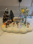 Holiday Living Musical Winter Vacation Scene # 0477384 Plays Jingle Bells Lights. Fixed Price $24.99.