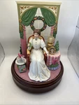 Avon Mrs Albee Musical Christmas Figurine. Fixed Price $120.00.