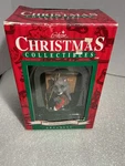Gibson Christmas Ornament Sneaking Peek Raccoon. Fixed Price $9.00.