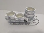 Yankee Candle Snowman Toboggan Sled Tealight Holder; White Silver. Fixed Price $12.95.