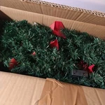 Guoou 9 Foot Christmas Garland Battery Operated Lighted Red Bows Pinecones Balls. Fixed Price $16.99.