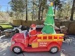 Fire Truck Christmas Inflatable North Pole. Works Great. 9 Ft Tall.. Fixed Price $125.00.