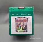Vtg Kirkland Water Window Lighted Musical Oh What Merry Little Christmas Day. Fixed Price $29.99.