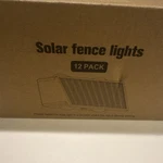 Niorsun Solar Fence Lights 12 Pack Black Led LH-TB21 LH-TB23 Outdoor. Fixed Price $20.00.
