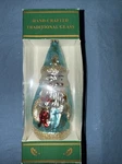 Kurt Adler Hand Crafted Traditional Glass Ornament Wizard With Wand & Doll GC866. Fixed Price $15.00.