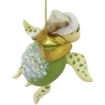 December Diamonds 79-81524 Sea Turtle With Scarf And Stocking Cap Resin Orname. Fixed Price $15.99.