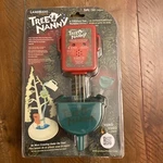 Tree Nanny Landmarc Christmas Watering System Plays Jingle Bells New Sealed. Fixed Price $23.88.