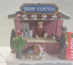 Happy Holidays Light-up Hot Cocoa Stand Scene House Store Christmas Village. Fixed Price $35.99.