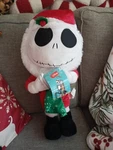 Disney Nightmare Before Christmas Jack Skellington W/stocking Porch Greeter 22". Fixed Price $40.00.