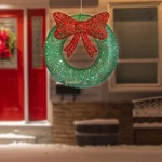 Northlight 24" Led Green Glitter Wreath Red Bow Outdoor Christmas Decoration. Fixed Price $106.49.