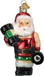 Old World Christmas Bodybuilder Santa Glass Blown Ornament For Tree,. Fixed Price $53.50.