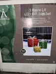 Holiday Wonderland 3 Piece Lighted Christmas Gift Box Set Yard Decoration New. Fixed Price $50.00.