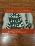 Fitz Floyd Santa's Kitchen Bell Shaped Snack Plate Candy Cane Spreader. Fixed Price $5.00.