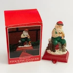 Potpourri 1993 Christmas Stocking Hanger Holder Santa Toy Shop Cast Iron Base. Fixed Price $15.00.
