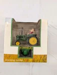 Spectra Cast Iron John Deere Holiday Christmas Stocking Holder Santa Tractor. Fixed Price $24.99.