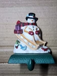 Vintage Eddie Bauer Snowman With Sled Cast Iron Stocking Holder Nos. Fixed Price $33.95.