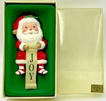 Vintage Christmas Stocking Hanger Holder Santa Claus Joy Russ Hong Kong Plastic. Fixed Price $19.95.