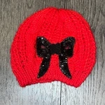 Black Sequined Bow Holiday Christmas Knit Hat. Fixed Price $24.00.