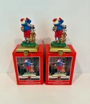 Lot Of 2 Potpourri Designs Golfing Santa Stocking Hanger W/cast Iron Base 1994. Fixed Price $22.00.