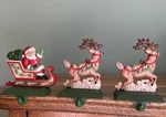 Midwest Of Cannon Falls Santa Reindeer Cast Iron Stocking Hanger. Fixed Price $174.99.