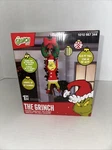 6.5' The Grinch Airblown Inflatable Hanging From Christmas Wreath Dr. Seuss New. Fixed Price $57.37.
