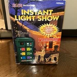 Noma Digital Decorating Instant Light Show 19 Pre-programmed Magic Christmas. Fixed Price $35.97.