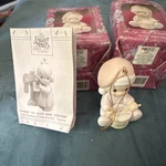 Enesco Precious Moments Baby's First Christmas Porcelain Ornament 1991 Set Of 3. Fixed Price $15.00.