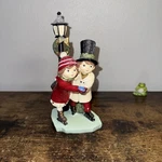 Christmas Figurines Boy And Girl Ice-skating. Fixed Price $12.00.
