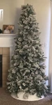 Artificial Pre-lighted Flocked Christmas Tree Green White Seasonal Theme Plastic. Fixed Price $70.00.