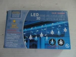 Everstar Led Snowflake Icicle Lights With 30 Cool White & Blue Bulbs, Wire. Fixed Price $22.95.