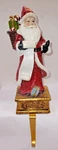 Regency Christmas Stocking Holder 12.5" Santa Checking His List Twice Resin. Fixed Price $19.99.