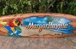 Margaritaville Tropical Parrot Surfboard Wall Plaque Mango Wood 39"X 10". Fixed Price $80.00.