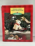 1997 Hallmark Nikki Dog On Sled Christmas Stocking Hanger - Free Shipping. Fixed Price $20.00.