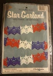 1984 Beistle Patriotic Star Garland Red White Blue Tissue Decoration 12 Feet. Fixed Price $27.00.