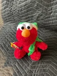Sesame Street Elmo Singing Christmas Plush Holiday Songs Santa Hat 8. Fixed Price $14.99.