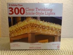 Holiday Time 17.67 Ft, 300CT Clear Incandescent Blinking Icicle Christmas Lights. Fixed Price $21.99.