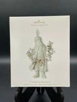 Hallmark Keepsake Ornament 2011 White Porcelain Santa Getting Into The Spirit. Fixed Price $10.00.
