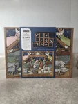 Lang Christmas Countdown, 12 Days Of Small Puzzles = Large Susan Wing. Fixed Price $18.99.