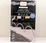 Gemmy Orchestra Of Lights 3-COUNT Led Christmas Candy Cane Arch Pathway Markers. Fixed Price $97.95.