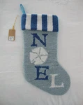Coastal Christmas: Noel Sand Dollar Hooked Stocking. Fixed Price $29.00.