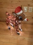 Illuminated Rudolph Reindeer Christmas Yard Sculpture With Santa Hat, 24". Fixed Price $29.00.