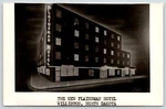 Williston North Dakota Plainsmen Hotel Vignette Night Lights Artist 1951 Rppc. Fixed Price $10.00.
