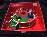 Gemmy Christmas Peanuts Gang Spinning Teacups Musical Carousel New Box. Fixed Price $49.99.