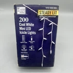 Home Accent Holiday Steady Lit 200 Cool White Mini Led Icicle Lights, 17.5 Ft.. Fixed Price $19.95.