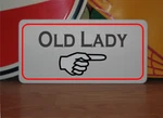 Old Lady W/ Arrow Metal Sign. Fixed Price $14.95.