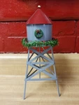 Seasonal Specialties Christmas Valley Hand Painted Porcelain Metal Water Tower. Fixed Price $20.00.
